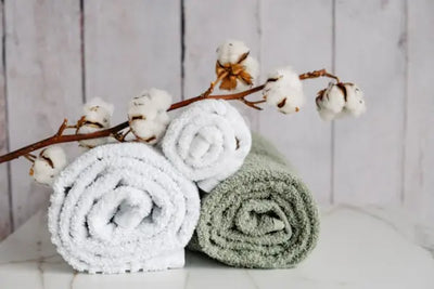 White and green cotton American made bath towels.