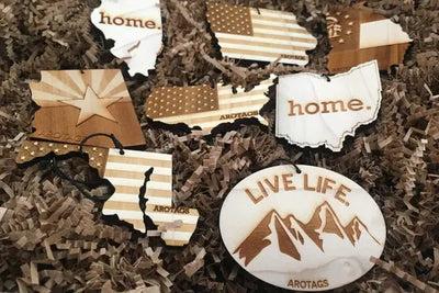 Air fresheners cut into state shapes.