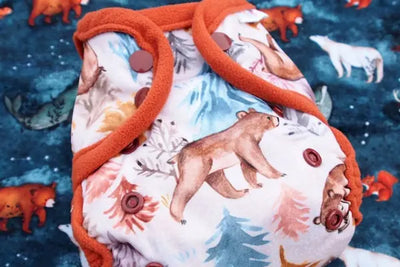 A bear themed cloth diaper.