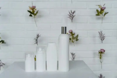 A table holding American made and handcrafted hair conditioners and hair treatments. 