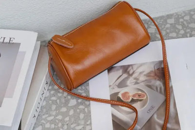 An American leather crossbody bag handcrafted in Maine. 