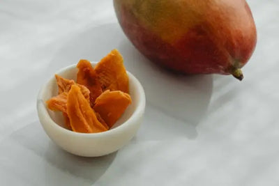 A bowl of dried mangos.