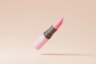 Pink American made lip color with the cap off. 