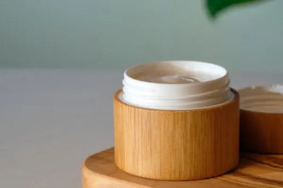 A wooden bottle of skin cream.