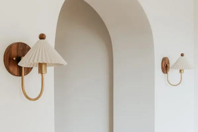 Modern copper and wooden sconces.