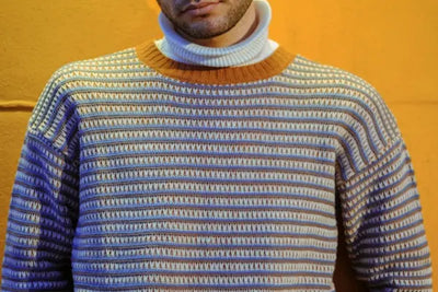 A two-tone knitted sweatshirt that was made in America.