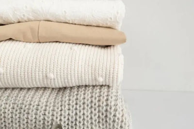 Four throw sized blankets that were each handcrafted in the United States of America
