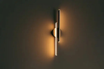 A modern, vertical wall light.