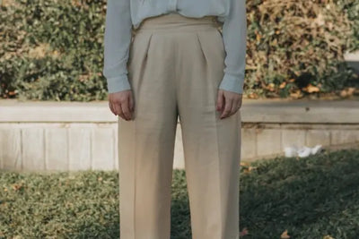 A pair of beige pants that were made in America and perfect for any woman's wardrobe.