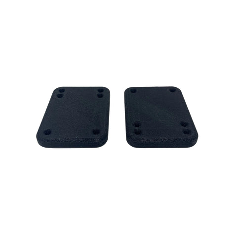 Two Chatelet Manufacturing Longboard/Skateboard 1/4 Inch Premium Riser Shock Pads, designed for enhanced riding quality and increased shock absorption, are placed side by side on a white background.