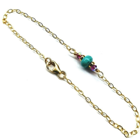 The 14K Gold Filled Pink and Turquoise Gemstone Dainty Bracelet by Alexa Martha Designs features a lobster clasp and delicate gemstone beads—a handmade accessory perfect for any occasion.