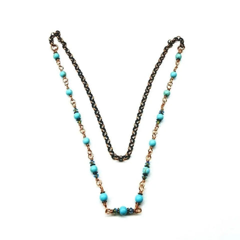 The Alexa Martha Designs Wire Wrapped 24 Inches Copper Turquoise Necklace features a dual-chain look: one black copper chain and another with alternating Chinese turquoise beads linked by gold wire.