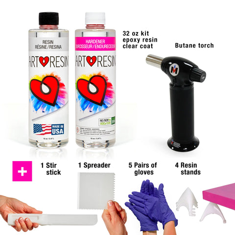 The ArtResin 32 Oz Epoxy Resin Starter Pack includes resin and hardener bottles, a butane torch, pink box with a plus sign, stir stick, spreader, 5 pairs of blue gloves, and 4 resin stands for easy crafting.
