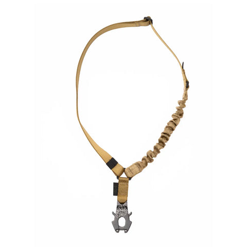 The MIS Multi Sling Gen1 - Coyote is a tan single-point tactical rifle sling with adjustable accessory strap, elastic section, and metal attachment clip, made from heavy nylon webbing and shown against a white background.