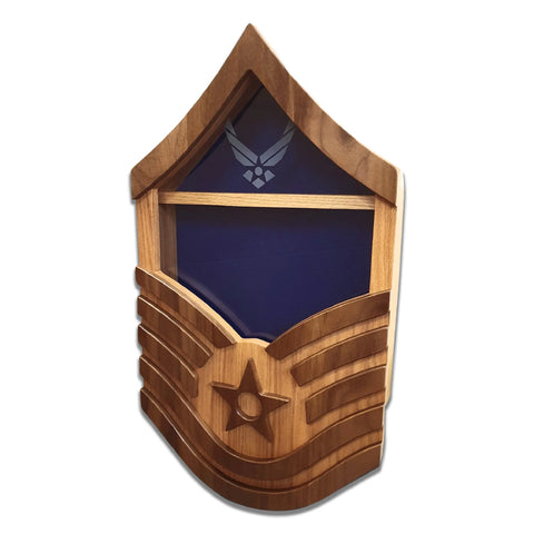 The Legacies of America Woodworking Companys Air Force Master Sergeant (E7) Shadow Box is a U.S.-made, veteran-crafted wooden display case shaped like the rank insignia. It features a star emblem and a glass-fronted compartment with a blue background.