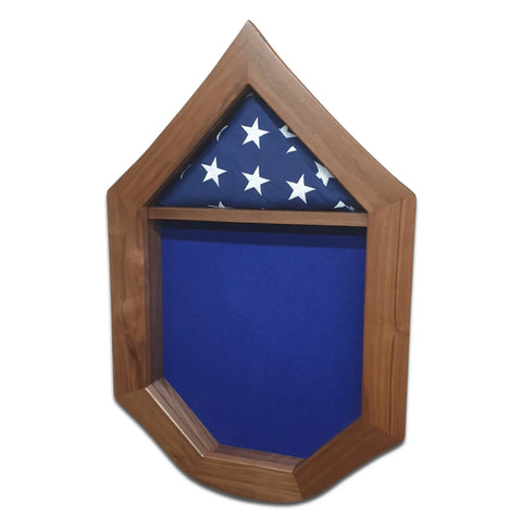 The Legacies of America Woodworking Companys Air Force SNCO Military Retirement Shadow Box - Walnut is a pentagon-shaped REAL Walnut display case made in the USA, holding a folded American flag above an empty, blue fabric-lined lower section.