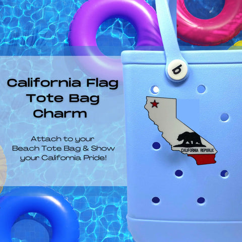 A Bogg Bag with a USA flag-shaped Boglets charm by Chatelet Manufacturing is featured by a pool with float rings. The image promotes displaying American pride—Boglets charms fit Bogg Bags, Simply Southern, and more tote bags.