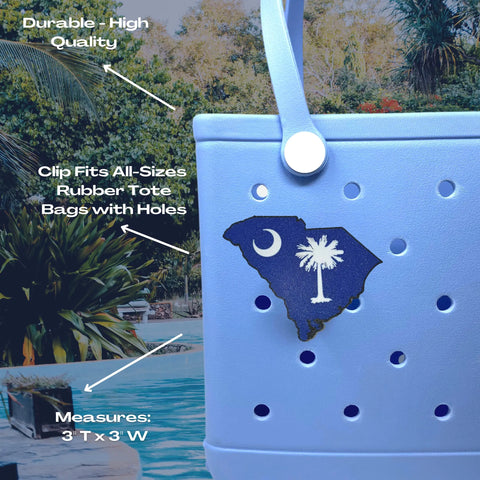 A blue rubber tote bag with a Chatelet Manufacturing Boglets USA Flag Charm, perfect for displaying patriotism. The charm is compatible with Bogg Bags and Simply Southern totes—durable, easy to clip on, and measures 3x3.