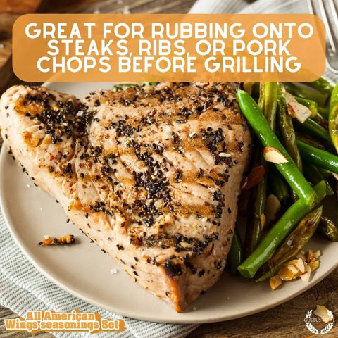 A grilled steak seasoned with pepper sits next to sautéed green beans and almonds. Try Gustus Vitae's All American Wings Gourmet Seasoning Set—handcrafted in the USA—for bold flavor on steaks, ribs, or pork chops before grilling.