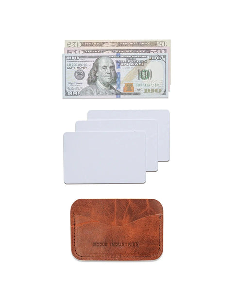 A stack of $100 and $20 bills, three blank cards, and the Rogue Industries Bison Card Case—made from American bison leather—are arranged vertically on a white background.