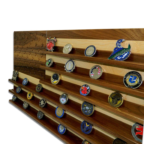 The American Flag Challenge Coin Display - Walnut & Maple by Legacies of America Woodworking Company features angled shelves for coins and engraved stars, crafted in the USA from walnut and maple.