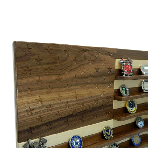 The Legacies of America Woodworking Company’s American Flag Challenge Coin Display – Walnut & Maple features engraved stars and slots for coins and badges, crafted in the USA from quality wood.