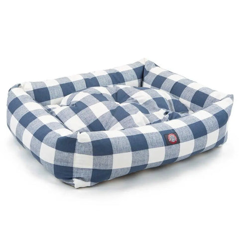 The Anderson Check Luxe Bagel Bed by Majestic Pet features high sides, a soft blue and white checkered cover, a cozy faux sheepskin cushion, thick padded edges, and a machine washable slipcover for comfort and easy cleaning.