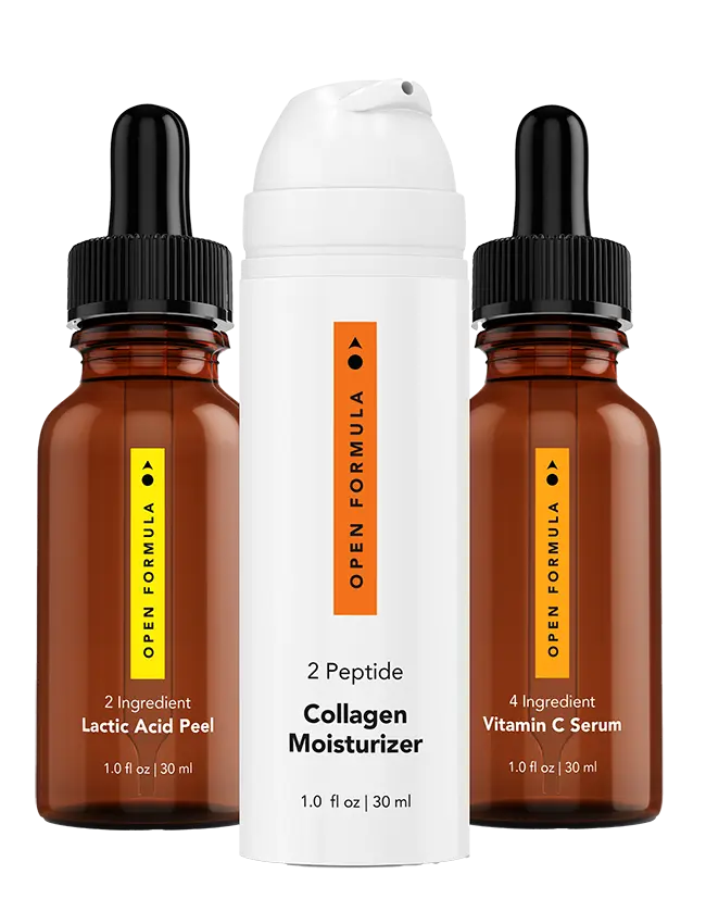 The Essentials Superset by Open Formula includes Lactic Acid Peel and Vitamin C Serum in brown dropper bottles, plus a Collagen Moisturizer in a white pump bottle.