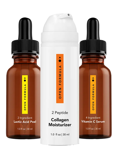 The Essentials Superset by Open Formula includes Lactic Acid Peel and Vitamin C Serum in brown dropper bottles, plus a Collagen Moisturizer in a white pump bottle.