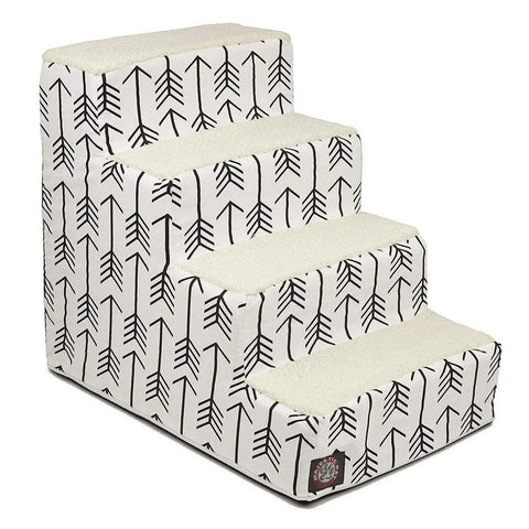 The Majestic Pet Arrow 4 Steps Pet Stairs (Heavy-Duty) features white fabric with black arrows, Sherpa cushions, beige carpeted treads, and a machine-washable slipcover—helping dogs and cats safely reach higher surfaces.