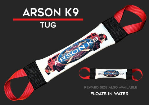 The Arson K9 Fire Hose Training Tug by Bulletproof Pet Products Inc is a white dog toy with red handles, a car graphic, and ARSON K9 in blue. Text notes: TUG, REWARD SIZE ALSO AVAILABLE, FLOATS IN WATER—ideal for canine tug training.