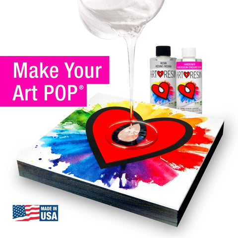 A hand pours 16 Oz (474 Ml) ArtResin epoxy resin onto a square artwork with colorful splatters and a red heart. ArtResin bottles, “Make Your Art POP,” and a Made in USA flag graphic are shown above the piece.