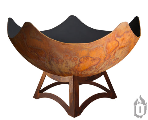 The Ohio Flame Stellar Artisan Fire Bowl With Hollow Base (Made in USA) features a large, round, rust-colored design with a wavy-edged rim on a sturdy matching metal base, displayed against a white background.