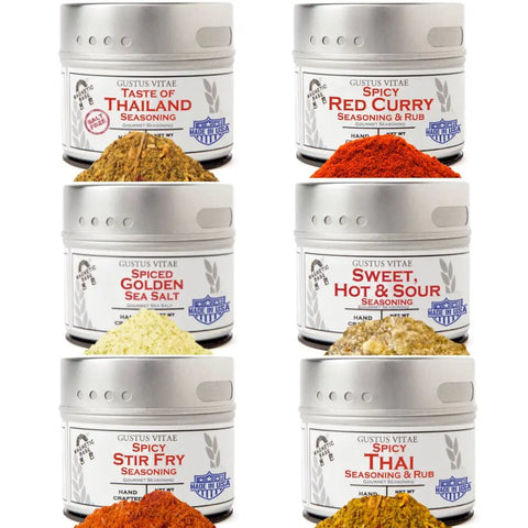 The Gustus Vitae Thai Seasoning Gift Set—Tastes of Thailand—features six artisanal spice blends in two columns, all crafted with all-natural ingredients.