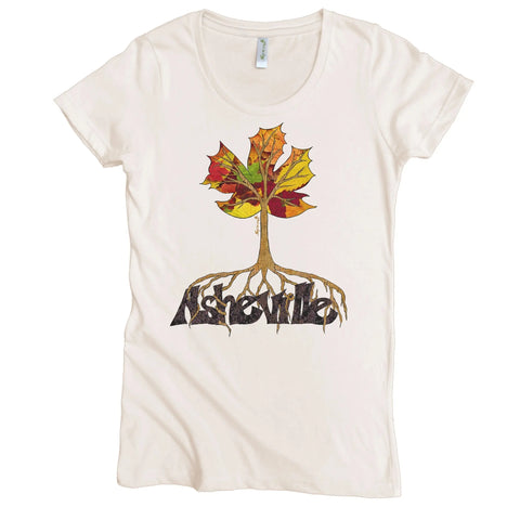 The Asheville Fall Rooted Graphic Tee (W) by Spiritex | Sustainable Apparel is made from 100% organic cotton and features a colorful autumn tree with roots spelling “Asheville.”.