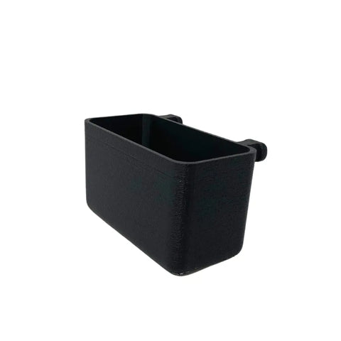 The BOGLETS Organizer Charm Accessory by Chatelet Manufacturing is a black plastic key holder with two back hooks, perfect for hanging on a wall or keeping keys and small items handy in your Bogg Bag.