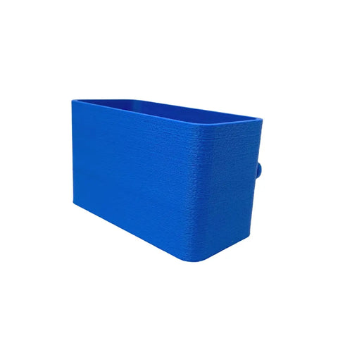 The BOGLETS Organizer Charm by Chatelet Manufacturing is a blue, rectangular plastic accessory with rounded edges and a textured finish, designed to hold keys or personal items on your Bogg Bag, shown against a white background.