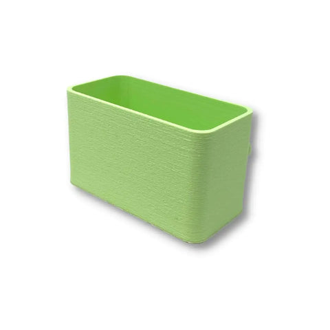 The BOGLETS Organizer Charm Accessory by Chatelet Manufacturing is a light green, rectangular, open-top holder with rounded edges, designed to keep keys or personal items handy in your Bogg Bag tote. Shown on a white background.