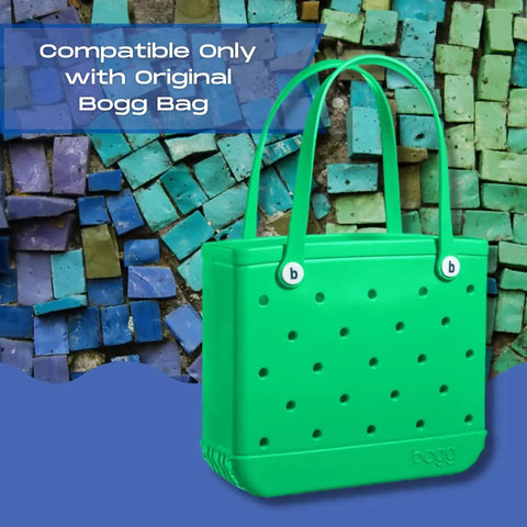 A bright green Bogg Bag by Chatelet Manufacturing is shown on a colorful tiled background. Text above reads, “BOGLETS - Organizer Charm Accessory, compatible only with Bogg Bags—keep keys or items handy with your tote bag.”.