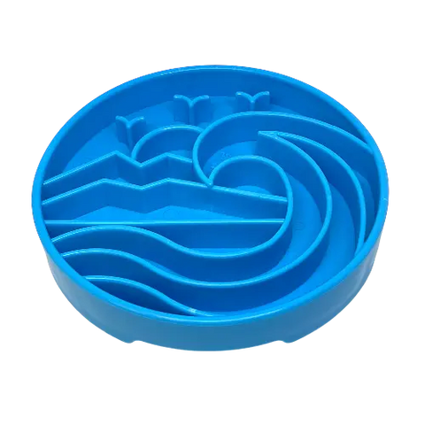 The SodaPup Baja Design ETray Enrichment Slow Feeder Tray for Dogs in light blue features raised wave and mountain shapes to separate food, promoting slower eating and enrichment.