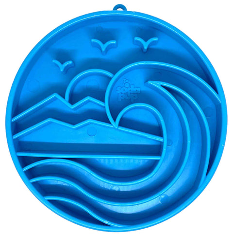 The SodaPup Baja Design ETray Enrichment Slow Feeder Tray for Dogs in light blue features raised wave, mountain, and bird designs, with a central logo. This round silicone mat is perfect for enhancing your dogs enrichment at mealtime.