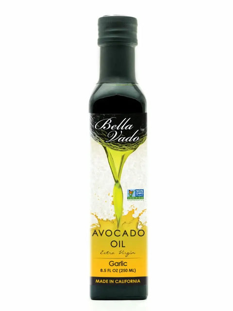 A 250 ml bottle of Bella Vado Avocado Oil Extra Virgin Avocado Oil features a green-yellow label with Made in California at the bottom. Enjoy this premium, cold-pressed oil for rich, natural flavor.