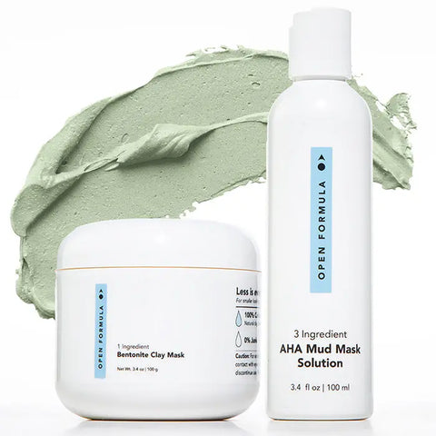 Open Formula Bentonite Clay Mask, in white packaging with minimalist blue and black text, is displayed in front of a green clay smear and features a formula that exfoliates skin and reduces acne scars.