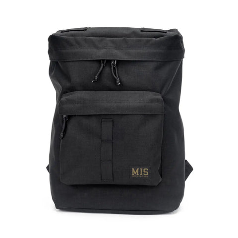 The MIS Backpack - Black features Cordura Nylon, a front zippered pocket, top drawstring closure, padded laptop holder, and a small yellow MIS logo label. Made in U.S.A., it stands upright on a white background.