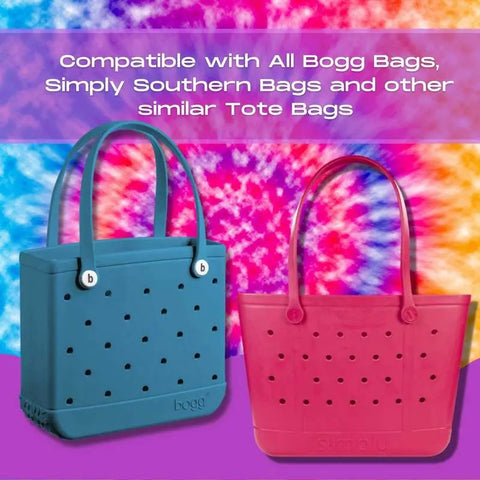 Add spirit to your tote with the BOGLETS Black Megaphone Charm by Chatelet Manufacturing—perfect for cheer teams and compatible with Bogg Bags, Simply Southern Bags, and similar totes. Shown on blue and pink bags against a vibrant tie-dye background.
