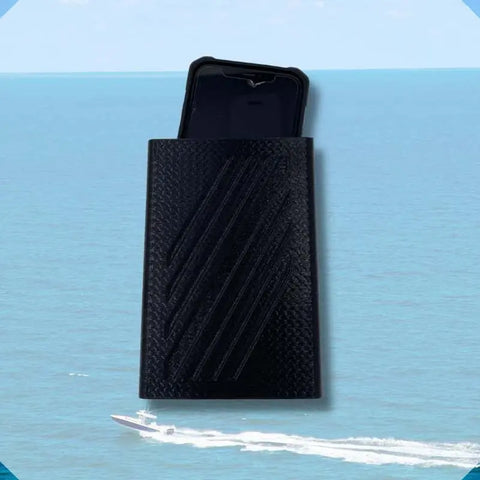 The FRESHe Boat Phone Holder by Chatelet Manufacturing, shown in black with a phone inside against a blue ocean and speedboat, keeps your phone dry and secure—perfect for safe boating adventures. Easily mounts to any boat and holds any phone.