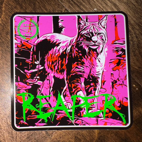The American Lictor Sticker: Bobcat - Reaper is a 3x3 vinyl featuring a bobcat in a pink and black forest, vivid neon green REAPER text at the bottom, and a circular green logo at the top left. Perfect for adding wild style anywhere.