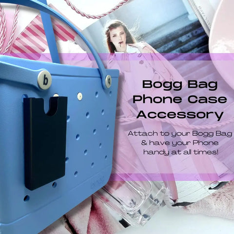 A blue rubber Bogg Bag with a black BOGLETS Phone Holder Charm Accessory by Chatelet Manufacturing is shown among pink-themed items, such as a photo of a woman in pink, a pink drink, and a book. Text highlights the phone holder for totes.