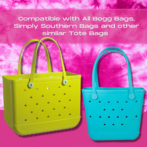 Two BOGLETS Phone Holder Charms by Chatelet Manufacturing, compatible with Bogg Bags and similar rubber tote bags, are shown on yellow and blue totes against a pink tie-dye background. Perfect for keeping your phone handy. Made in the USA.