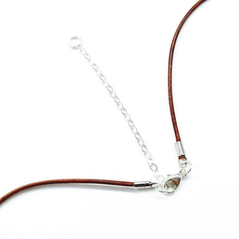 Alexa Martha Designs Silver Green Blue Shell Bead Charm Leather Necklace features a brown leather cord, sterling silver lobster clasp, chain extender, and is displayed on a white background.